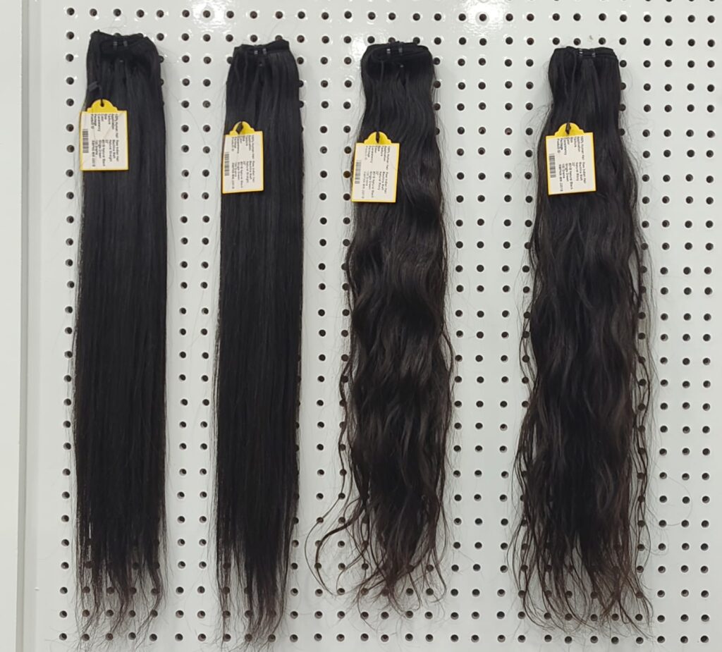Human hair bundles for weave: natural straight and natural wavy single-donor virgin Remy bundles in natural black